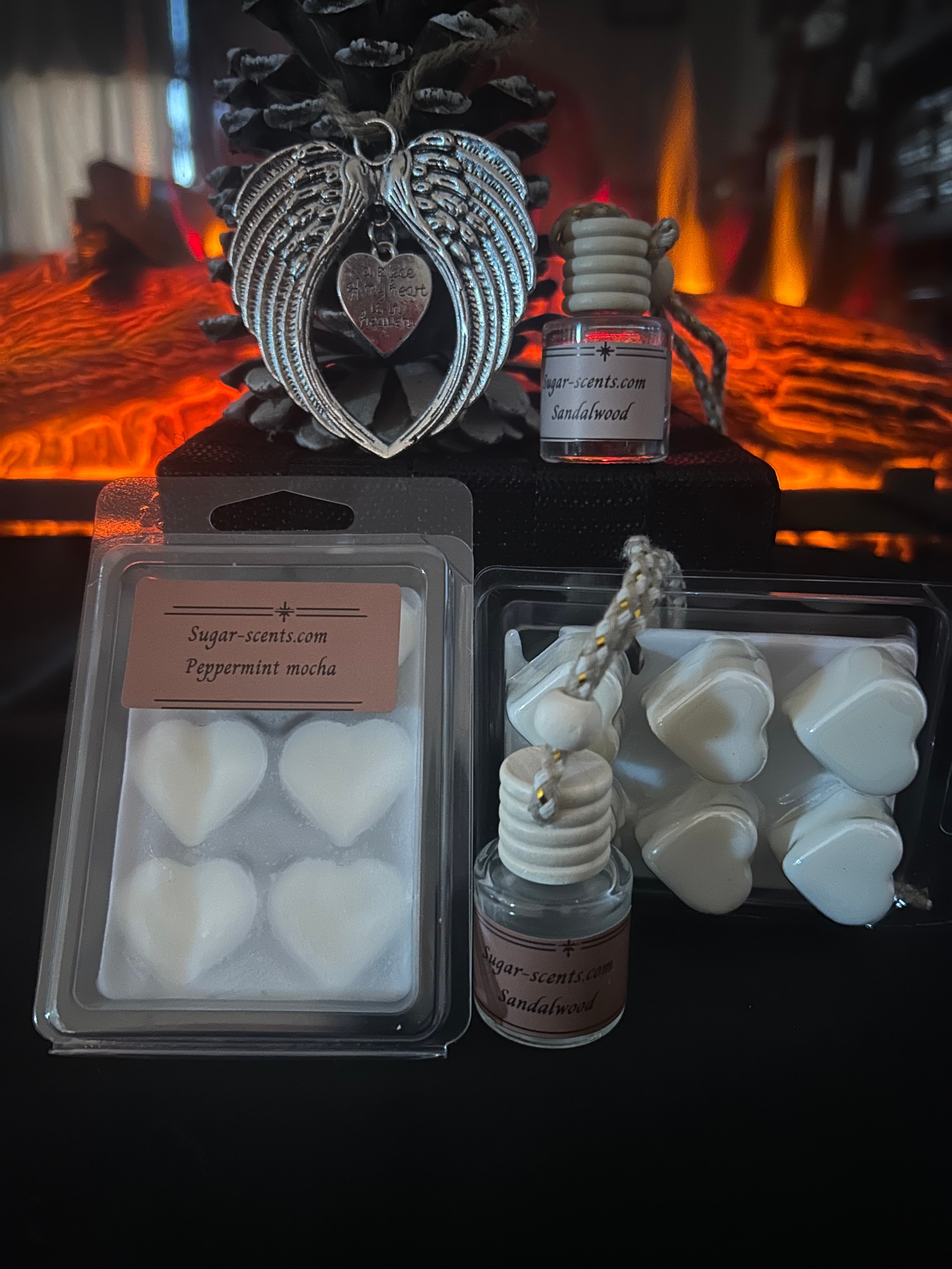 Sugar Scents products styled with memorial wings ornaments and gift box